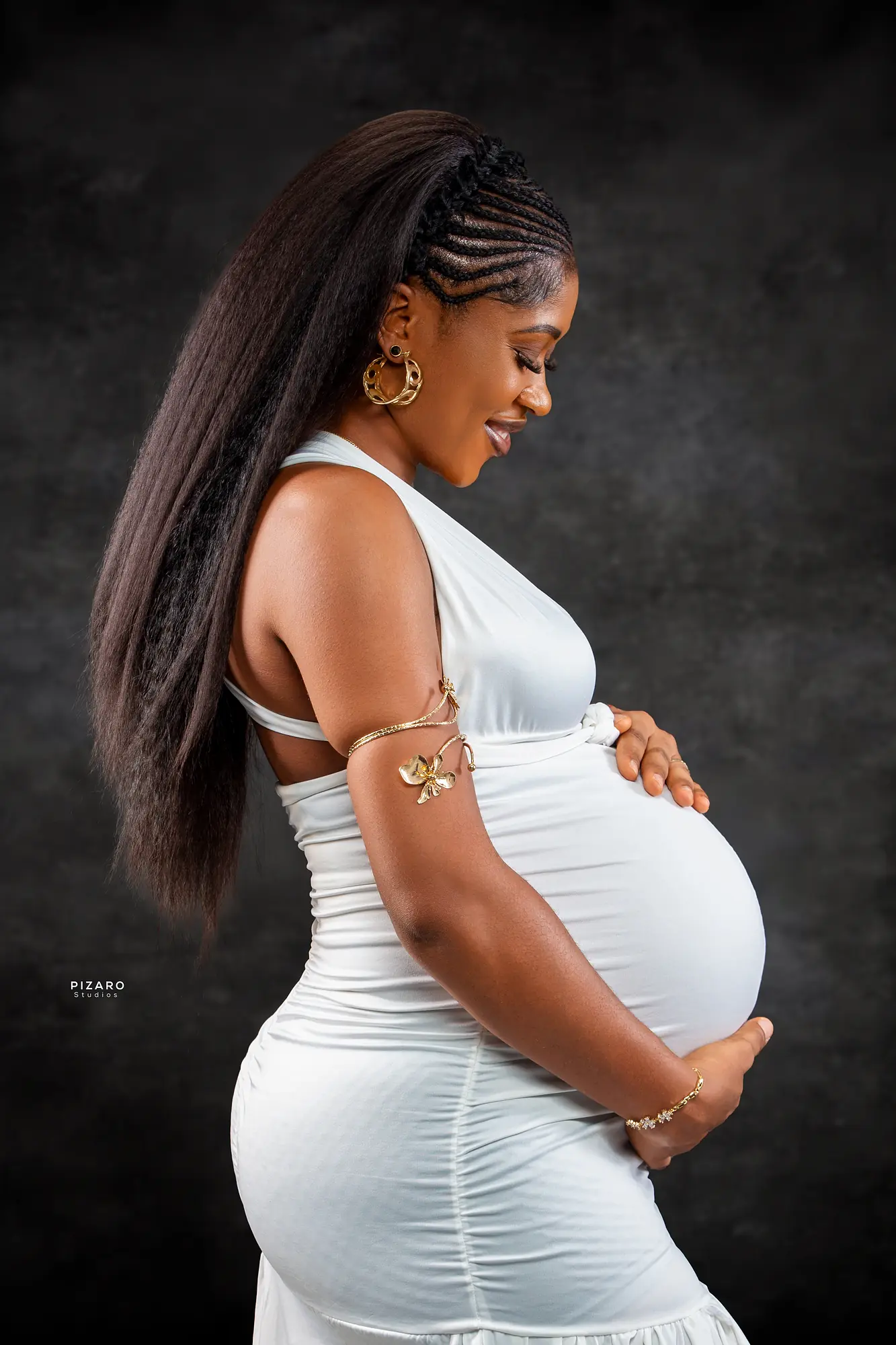 Pizaro Studios maternity session — profile portrait in white and gold draping