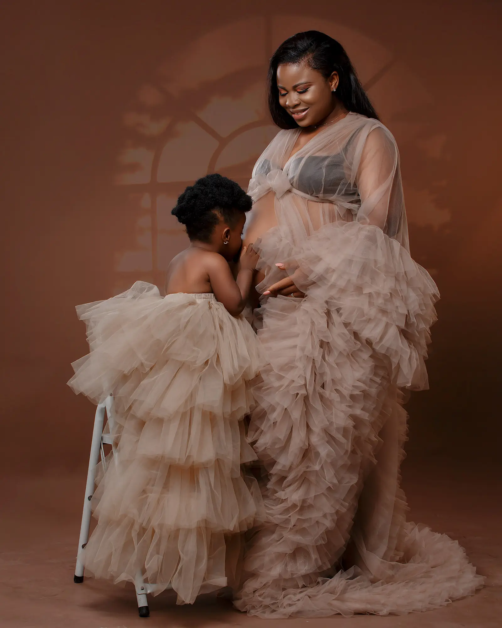 Pizaro Studios maternity session — mother-to-be with her toddler in soft tulle